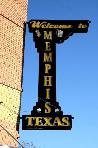 iron metal welcome sign